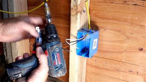 electrical making up boxes rough in|roughing in electrical outlets.